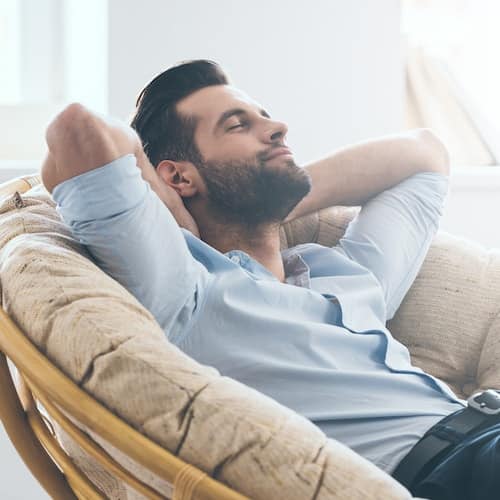 Restorative Dentistry Palm Beach Gardens - Sedation Dentistry A man relaxing thanks to sedation and Restorative Dentistry Palm Beach Gardens