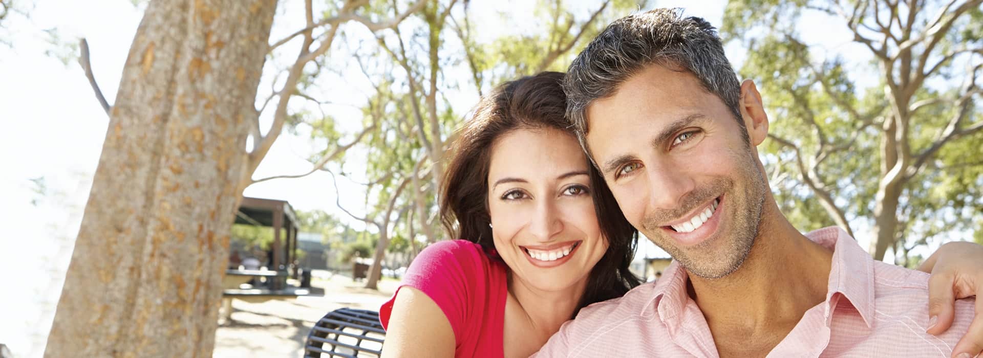 Palm Beach Gardens Cosmetic Dentistry - Smiling Couple A couple who are smiling thanks to Palm Beach Gardens Cosmetic Dentistry